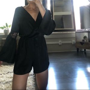 Long sleeve black satin romper